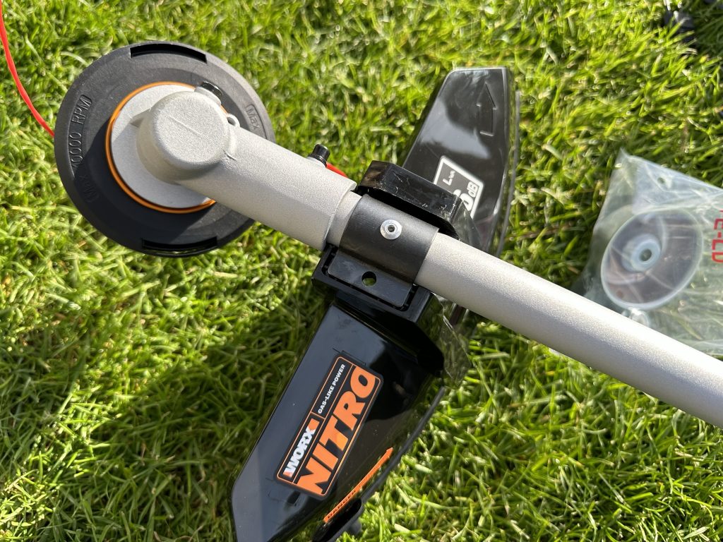 WORX-NITRO-WG186E-rasentrimmer-spritzschutz