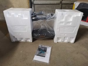 TRITTBRETT Paul Elektro-Scooter in Styropor-Verpackung