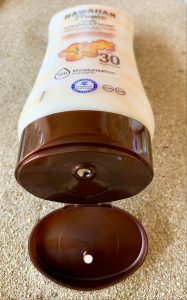 Hawaiian-Tropic-Silk-Hydration-Protective-Sonnencreme-geöffnet-von-vorne