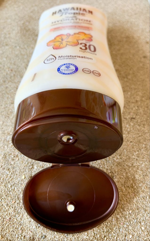 Hawaiian-Tropic-Silk-Hydration-Protective-Sonnencreme-geöffnet-von-vorne