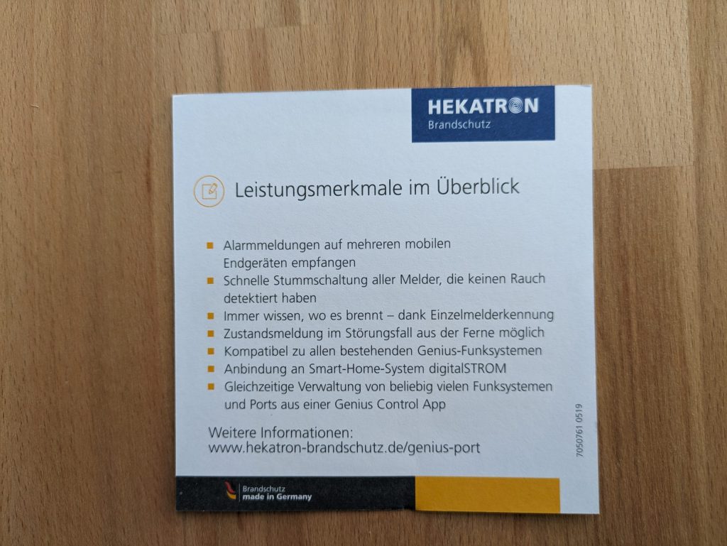 Beipackzettel des Hekatron Genius Plus X Rauchmelders von hinten