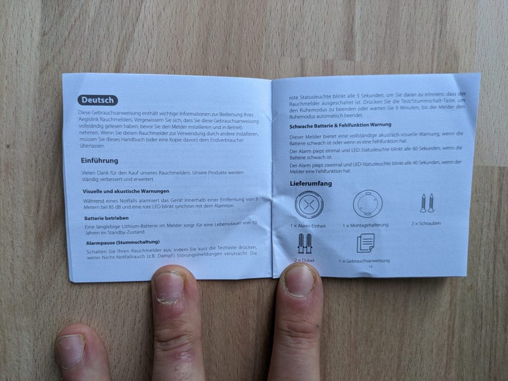 Geöffnetes Inhaltsverzeichnis des Aegislink S500 Rauchmelders kleine Schrift