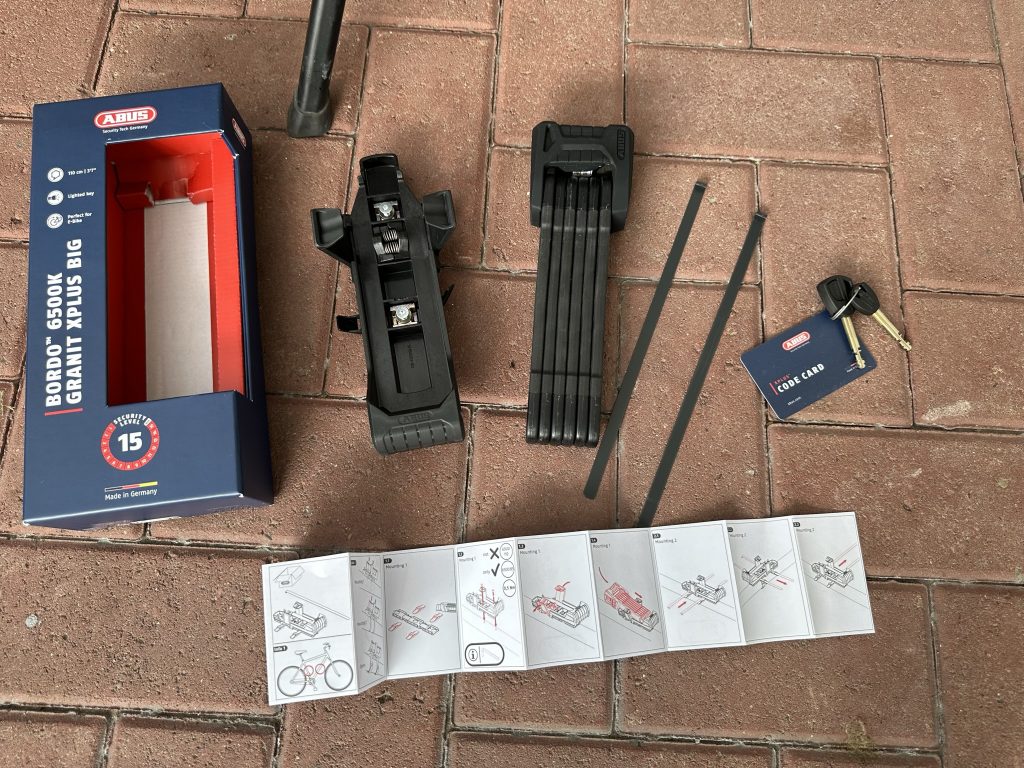 Fahrradschloss mit Originalverpackung, Bedienungsanleitung und mit Zubehörteilen