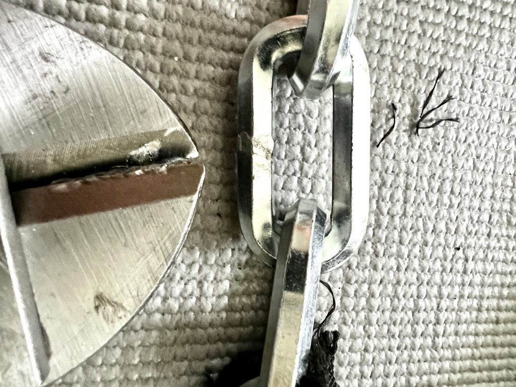 Bolzenschneider-Test am Kettenglied