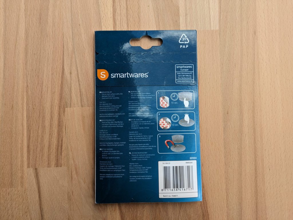 Verpackung der Klebehalterung des Smartware FSM 124 Rauchmelders von hinten