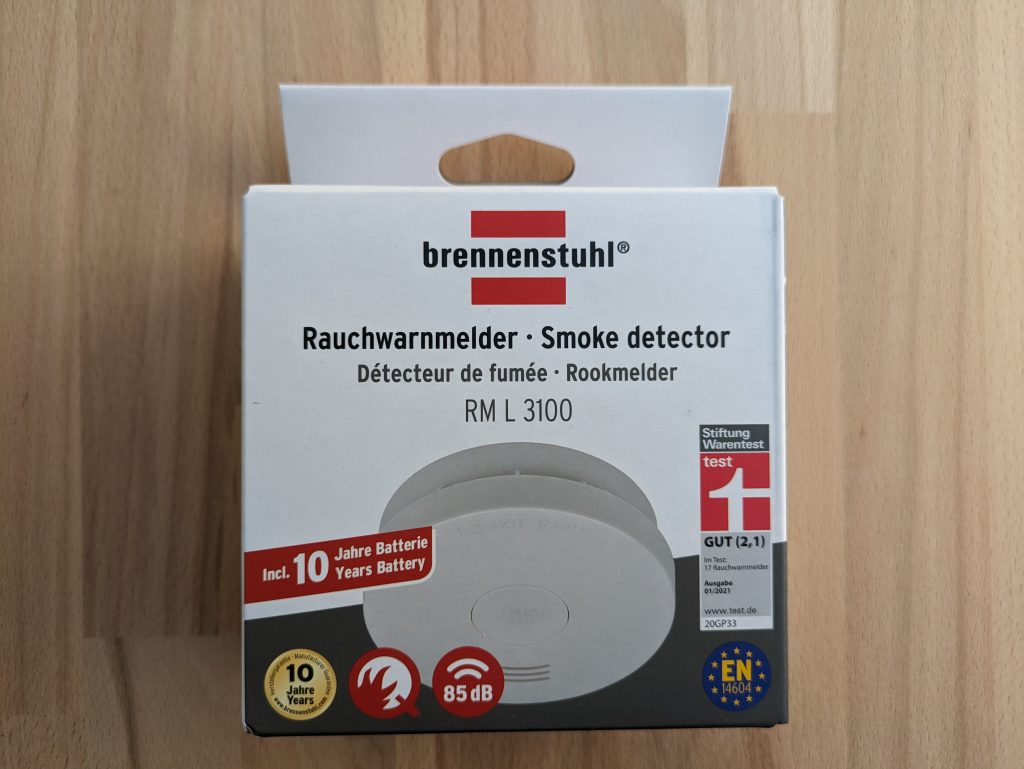 Verpackung des Brennenstuhl RM L 3100 Rauchmelders von vorne