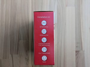 Verpackung des Ei Electronics Ei650 RF Rauchmelders von links