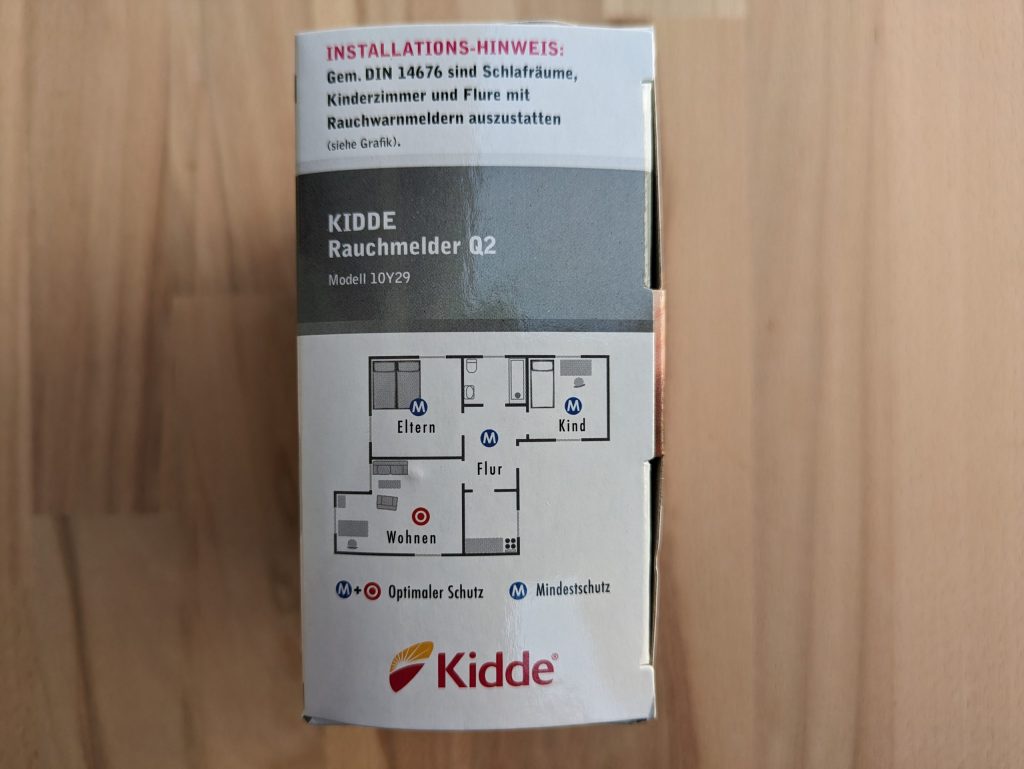 Verpackung des Kiddie Q2 Rauchmelders von rechts