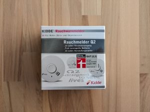 Verpackung des Kiddie Q2 Rauchmelders von vorne