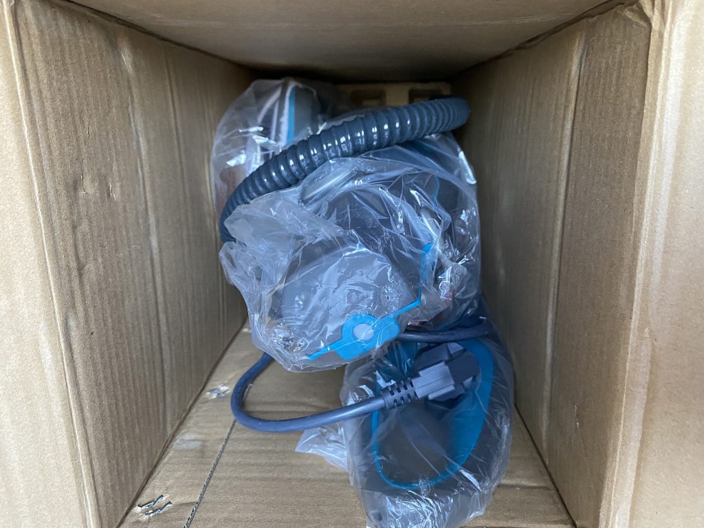 Hoover Steam Capsule Dampfreiniger in der Verpackung