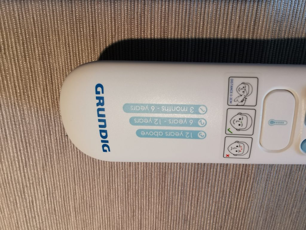 Grundig 20021 Ohrthermometer Detail altersspezifische Messung
