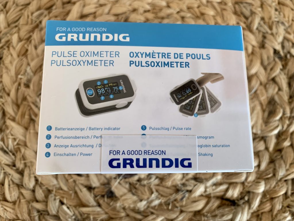 Grundig 20040 Pulsoximeter im Karton von hinten
