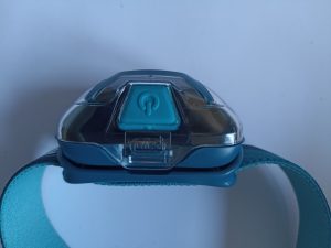 PETZL Tikka Stirnlampe, Ansicht oben, Bedienknopf