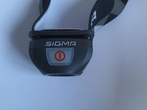 Sigma Sport HeadledII Stirnlampe, Ansicht von oben, Bedienknopf