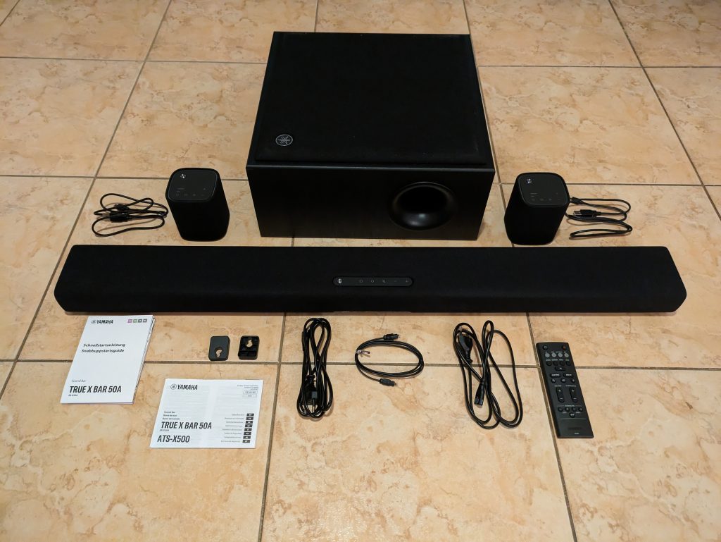 Gesamter Lieferumfang der Yamaha True X Bar 50A Soundbar