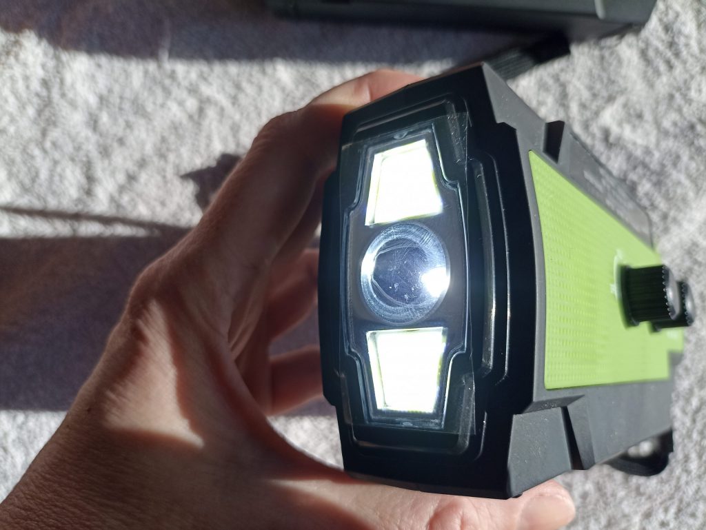 Nigecue Radio01-d Kurbelradio, Taschenlampe mit Fernlicht und Abblendlicht