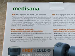 Verpackung der Medisana MG600 Massagepistole von hinten, in der Nahansicht
