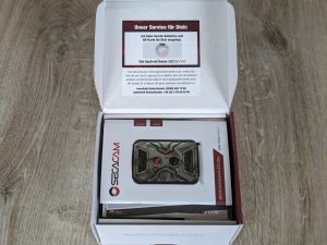 Verpackung der SECACAM Wild-Vision Wildkamera, geöffnet