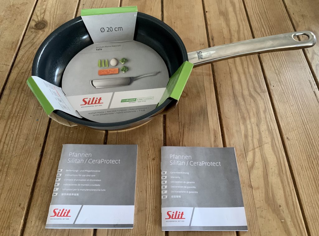 Silit Talis beschichtete Pfanne mit Pappschutz, Bedienungsanleitung und Garantieheft
