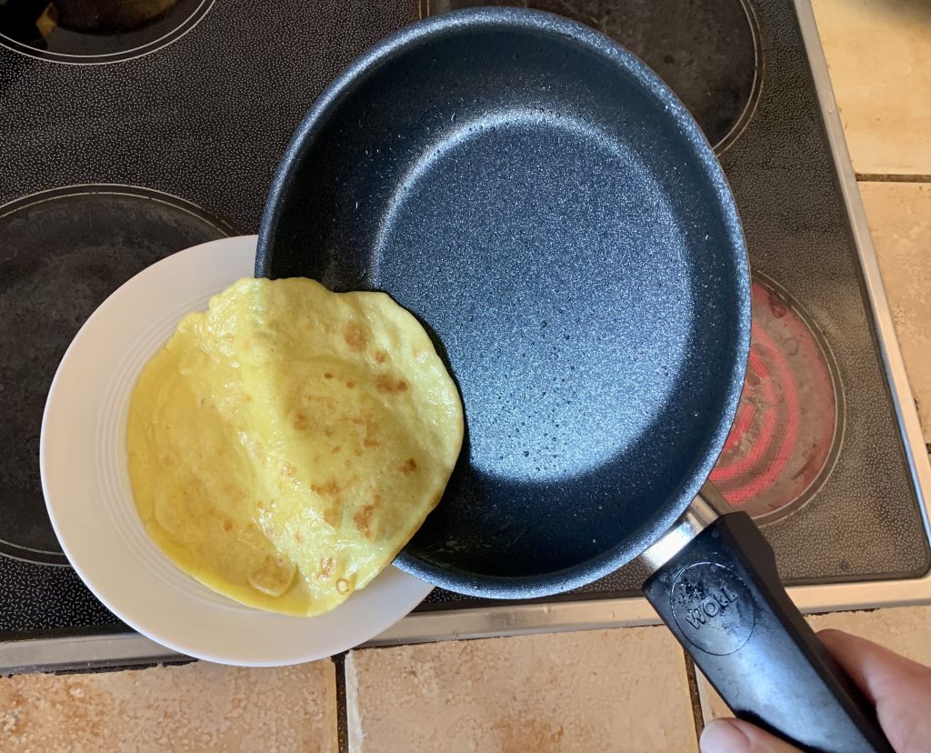 Woll Concept beschichtete Pfanne Pfannkuchen auf den Teller