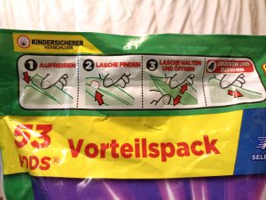 Ariel Allin1 PODS Waschmittel, Verpackung Vorderseite, Beschriftung Kindersicherer Verschluss