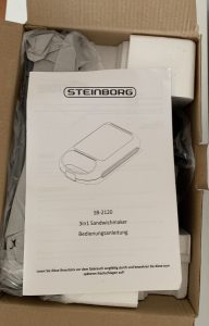 Steinborg XXL-Sandwichmaker im geöffneten Karton von oben