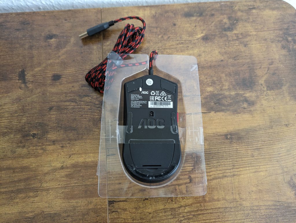 Hülle der AOC Agon AGM700 Gaming-Maus von unten