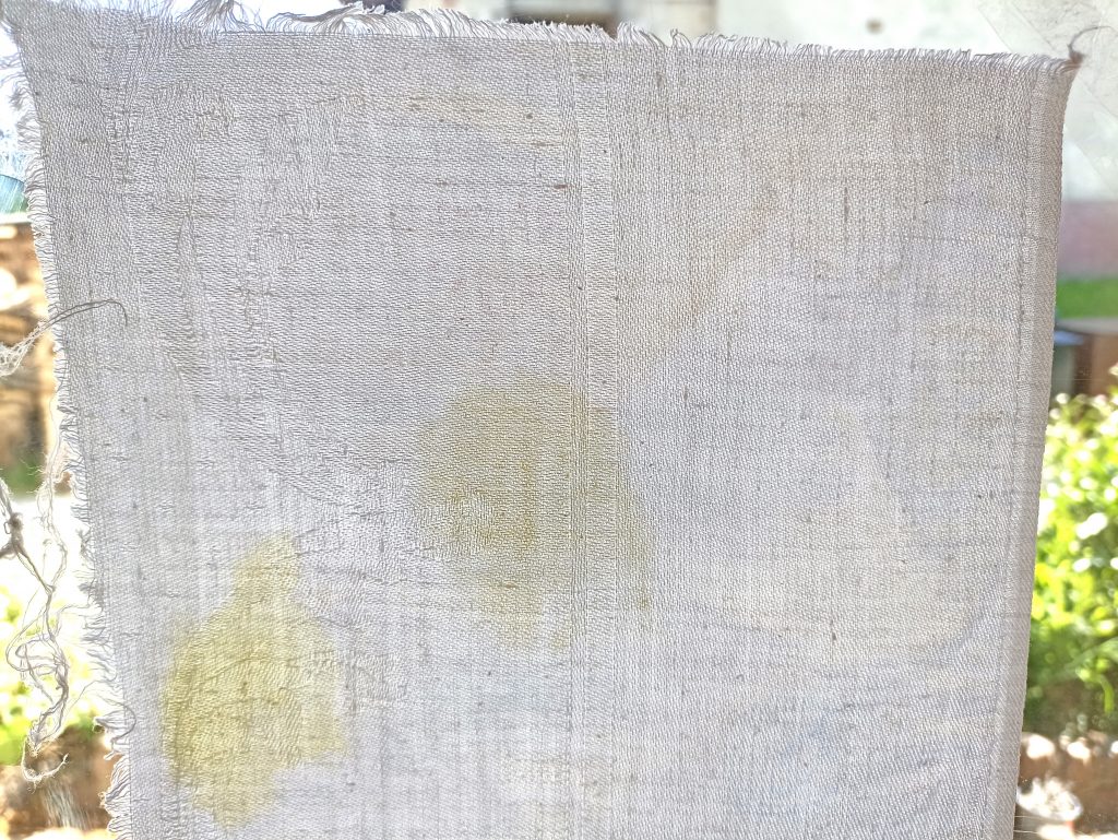 Persil Green Power Waschmittel, Ergebnis Kaltwäsche 30 Grad, im Durchlicht, oberer Abschnitt