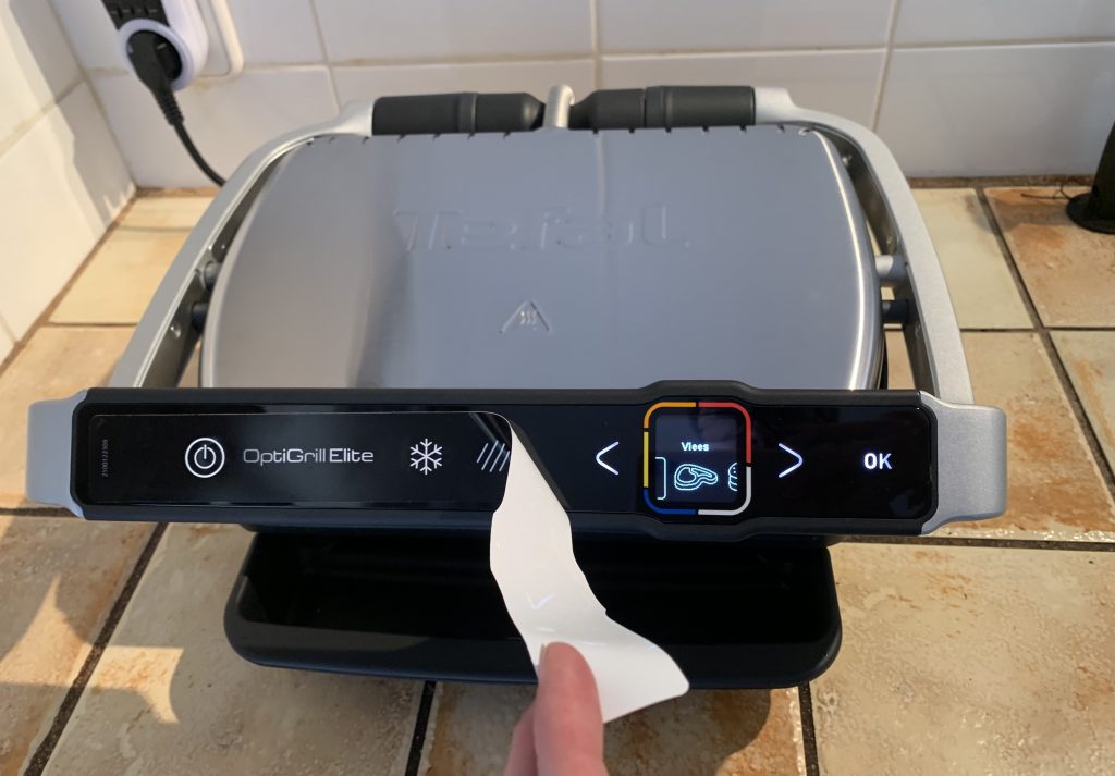 Tefal OptiGrill Elite GC750D16 Kontaktgrill Entfernen des Aufklebers vom Bedienelement