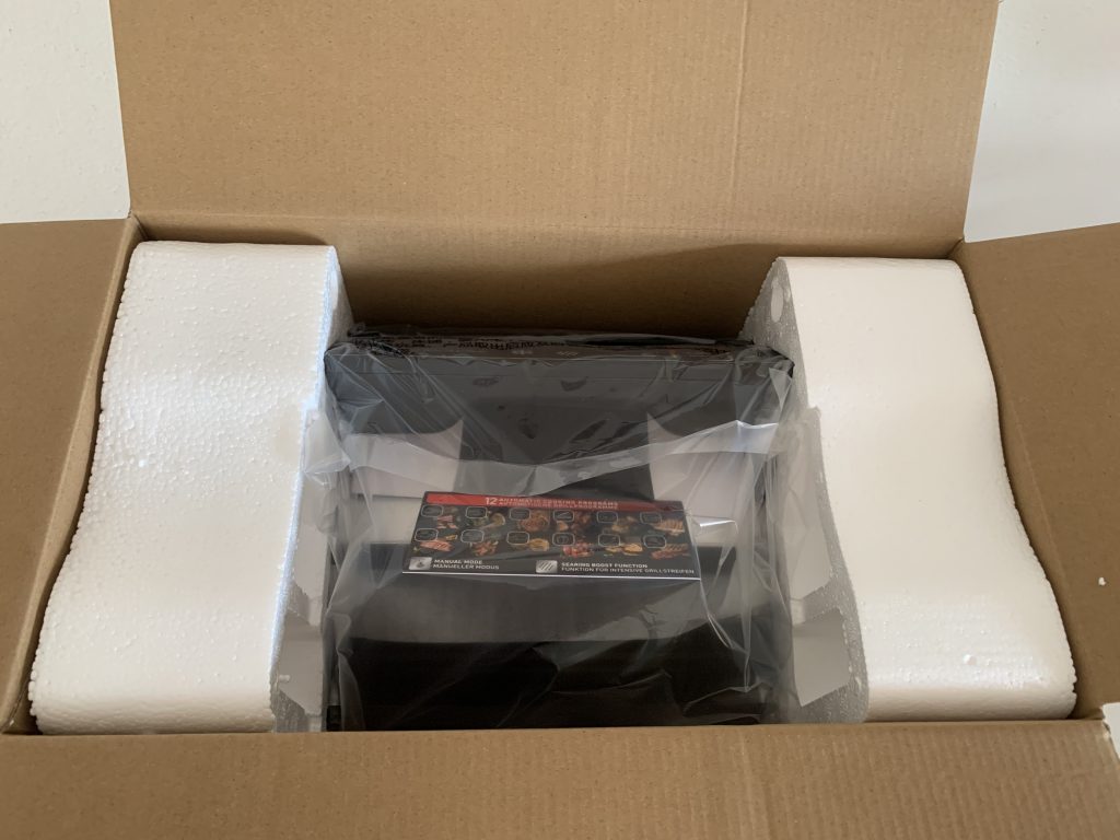 Tefal OptiGrill Elite GC750D16 Kontaktgrill geöffneter Karton von oben
