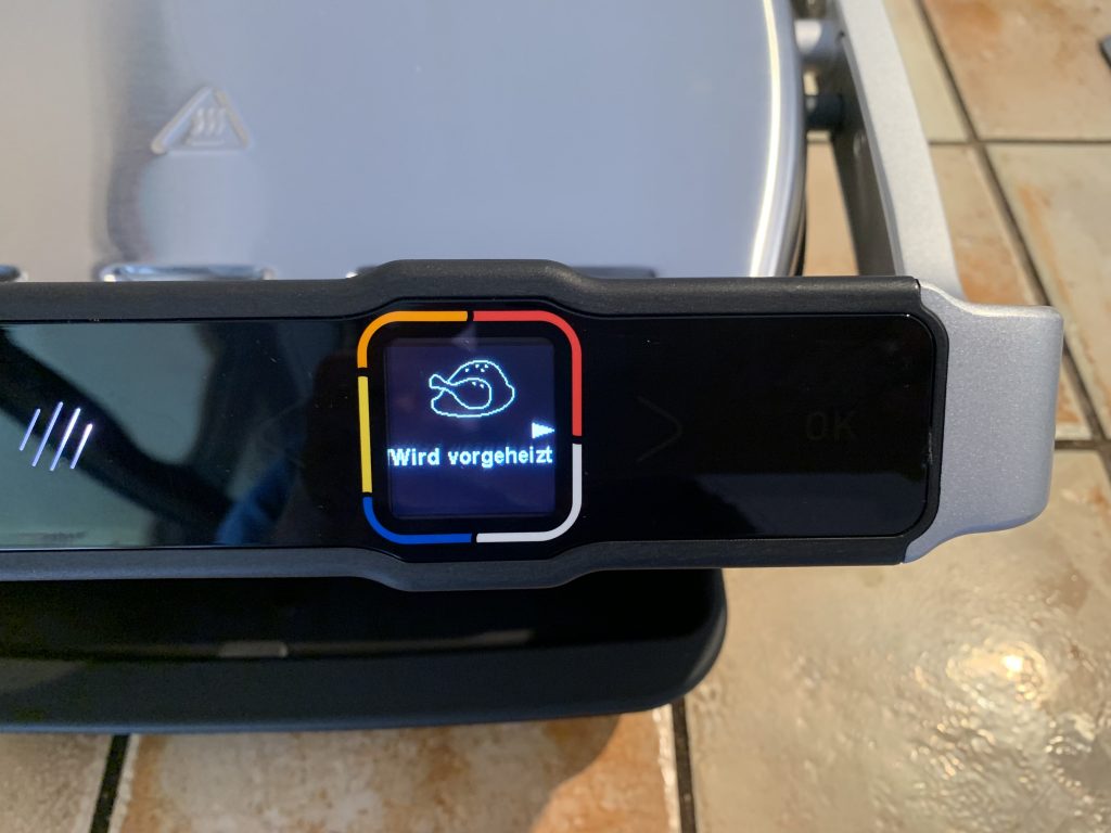 Tefal OptiGrill Elite GC750D16 Kontaktgrill im Aufheizmodus