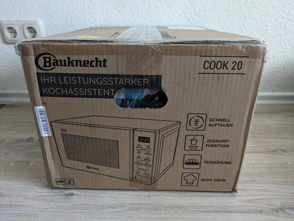 Verpackung der Bauknecht MWK 201 B Mikrowelle von der Seite
