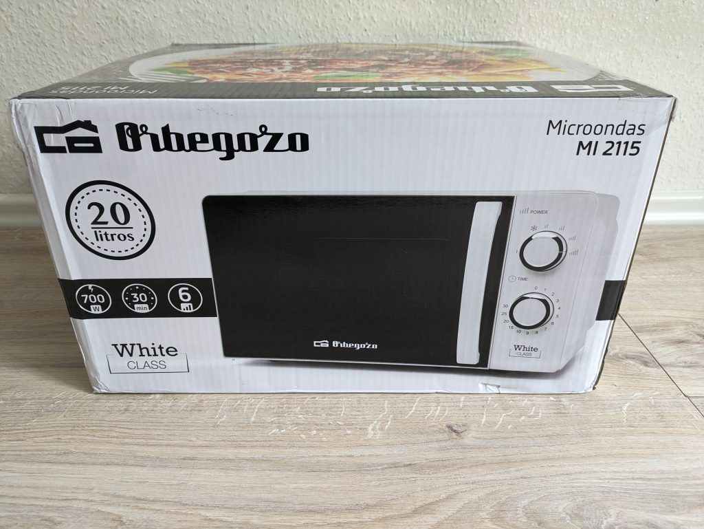 Verpackung der Orbegozo MI 2115 Mikrowelle von hinten