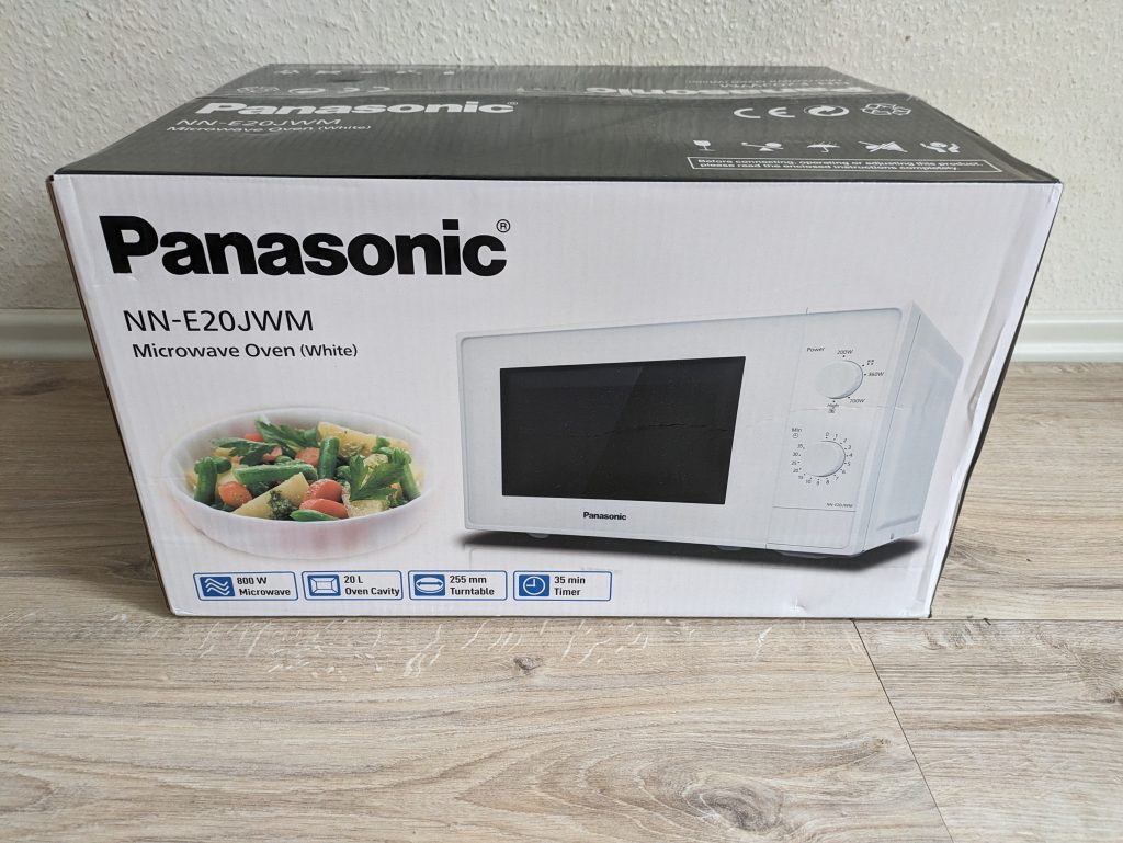 Verpackung der Panasonic NN-E20JWMEPG Mikrowelle von hinten