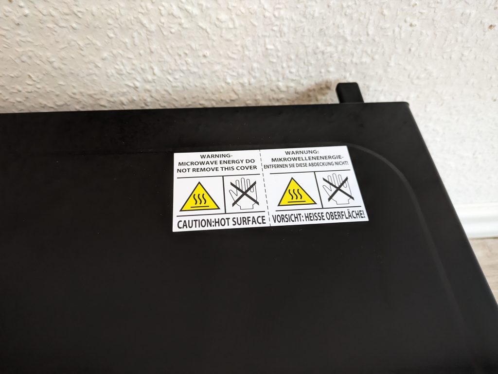 Warnhinweis der Toshiba MV-AM20T Mikrowelle