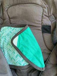 Infantino Flip Advanced Babytrage Lätzchen Befestigung