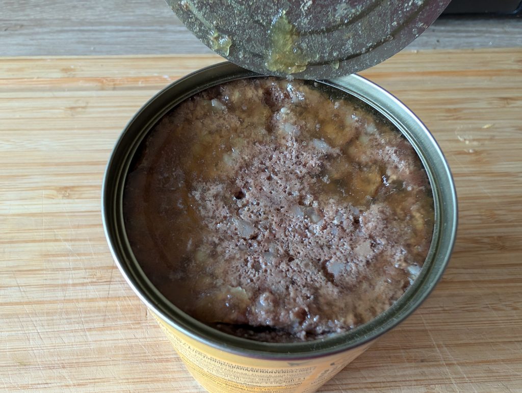 Pedigree Junior Pastete mit Geflügel Hundefutter Dose geöffnet