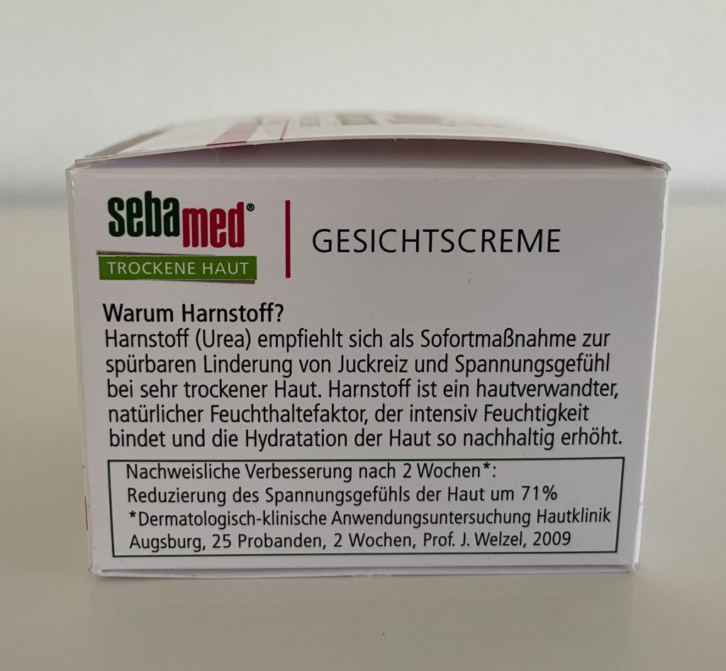 Sebamed Trockene Haut Urea Akut 5% Gesichtscreme in der Verpackung von der linken Seite