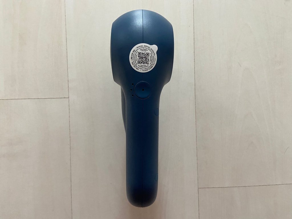 Theragun Relief Massagepistole von hinten