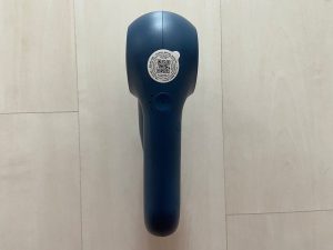 Theragun Relief Massagepistole von hinten