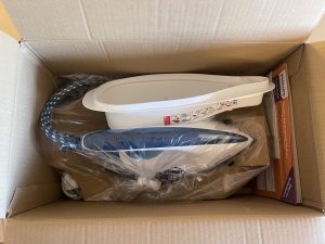 Philips PerfectCare Compact GC7844:20 Dampfbügelstation im geöffneten Karton
