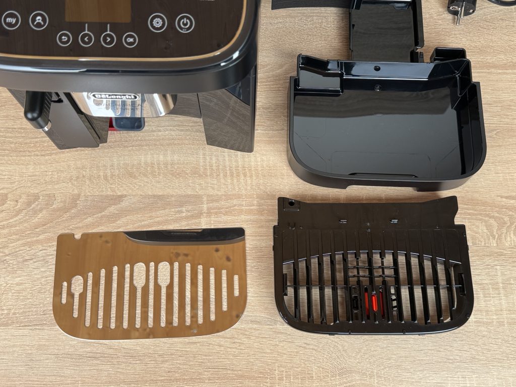 De'Longhi Magnifica Evo Next ECAM 310.60.B Kaffeevollautomat Detail zerlegte Abdropfschale