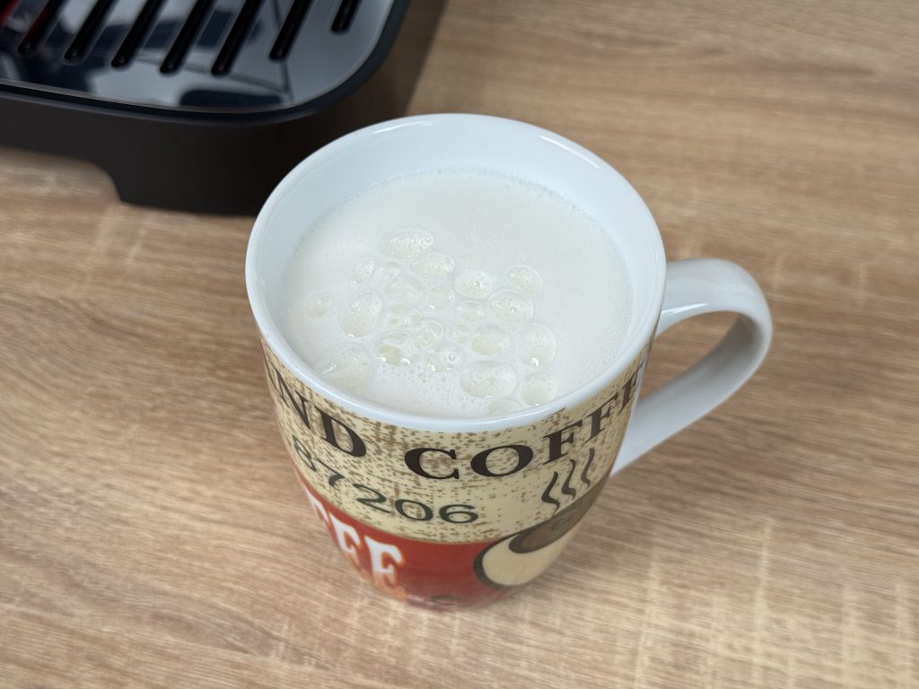 De'Longhi Magnifica Evo Next ECAM 310.60.B Kaffeevollautomat abgefüllte heiße Milch