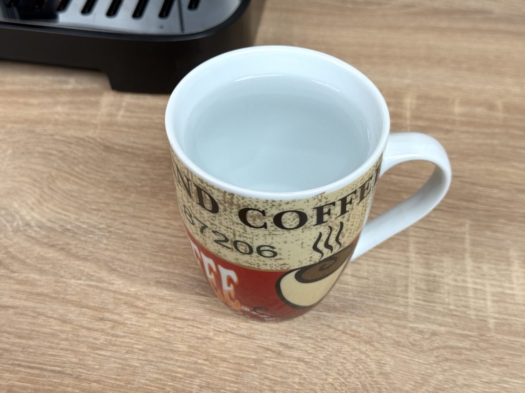 De'Longhi Magnifica Evo Next ECAM 310.60.B Kaffeevollautomat abgefülltes heißes Wasser