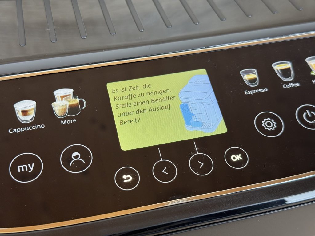 De'Longhi Magnifica Evo Next ECAM 310.60.B Kaffeevollautomat Anzeige Reinigung der Karaffee