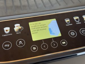 De'Longhi Magnifica Evo Next ECAM 310.60.B Kaffeevollautomat Anzeige Reinigung der Karaffee