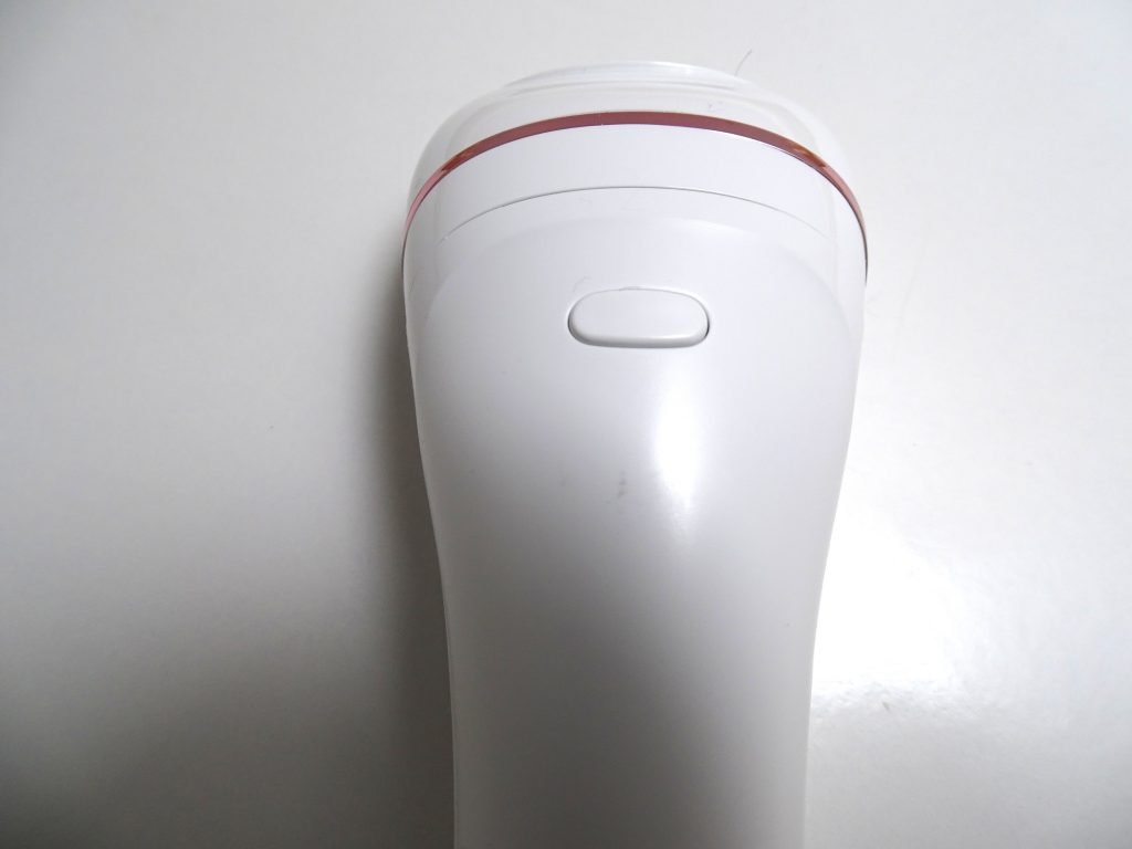 Philips BRE74010 Epilierer Entriegelungstaste