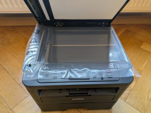 Brother DCP-L2550DN Multifunktionsdrucker mit Scanner-Schutz