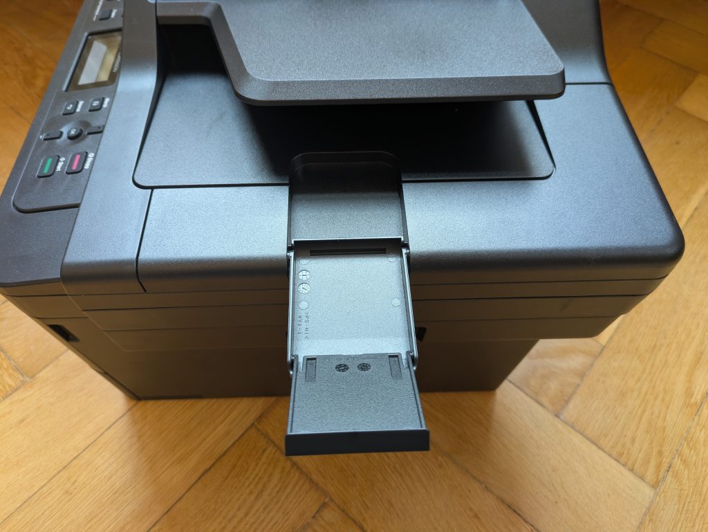 Brother DCP-L2550DN Multifunktionsdrucker von Rechts mit ausgefahrer Stütze