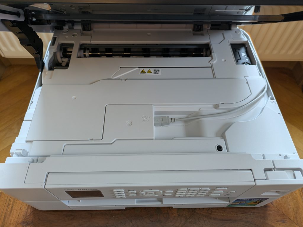Brother MFC-J1010DW Multifunktionsdrucker geöffnet von oben
